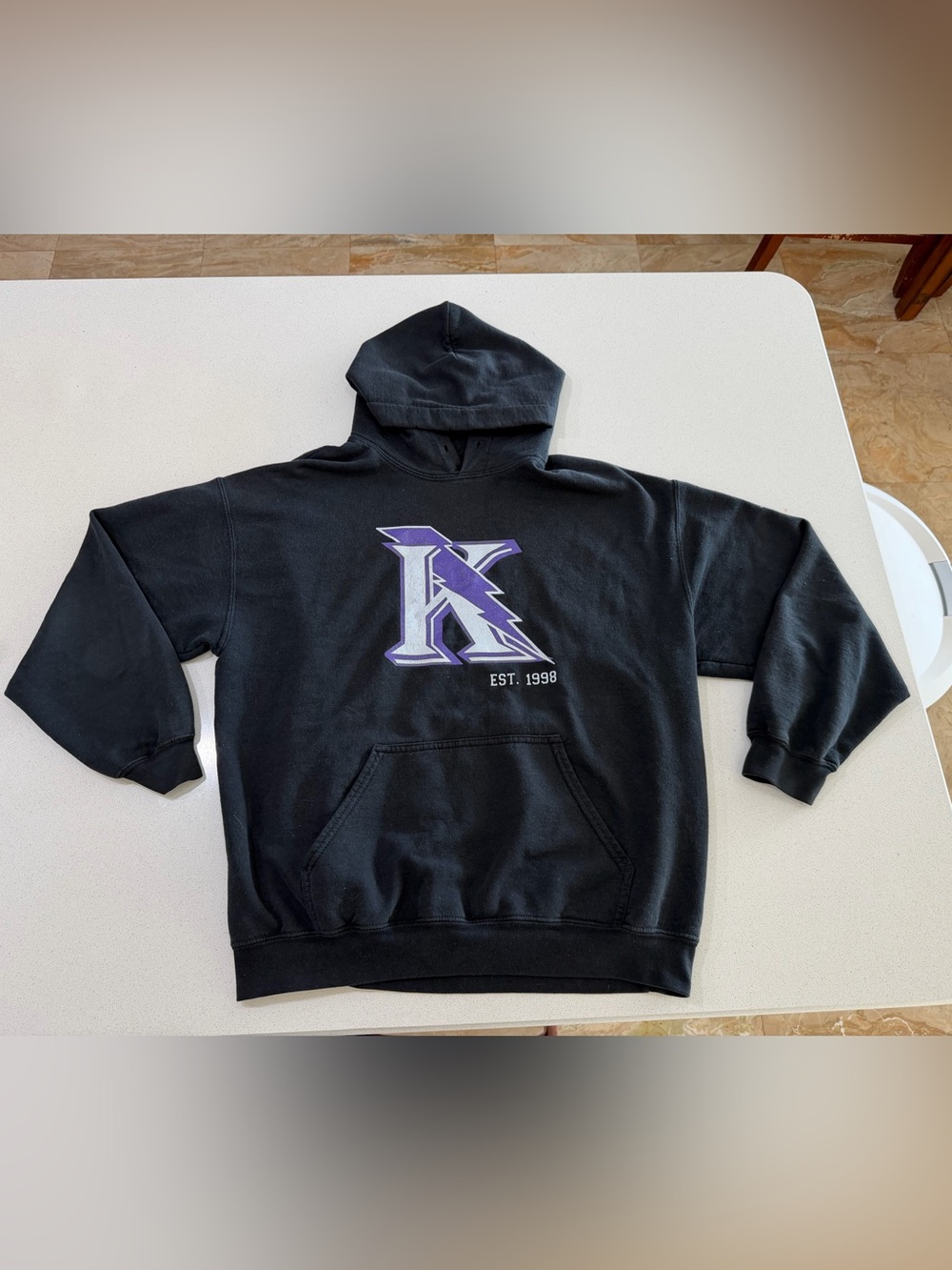Black Pullover Hoodie with Purple 'K' Graphic